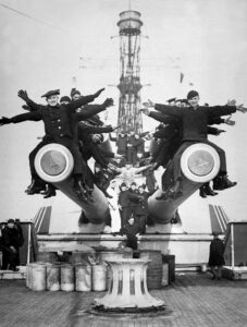 Figure 1: Sailors on the 14-inch guns of the USS Texas, the last remaining dreadnaught. (Wikipedia)